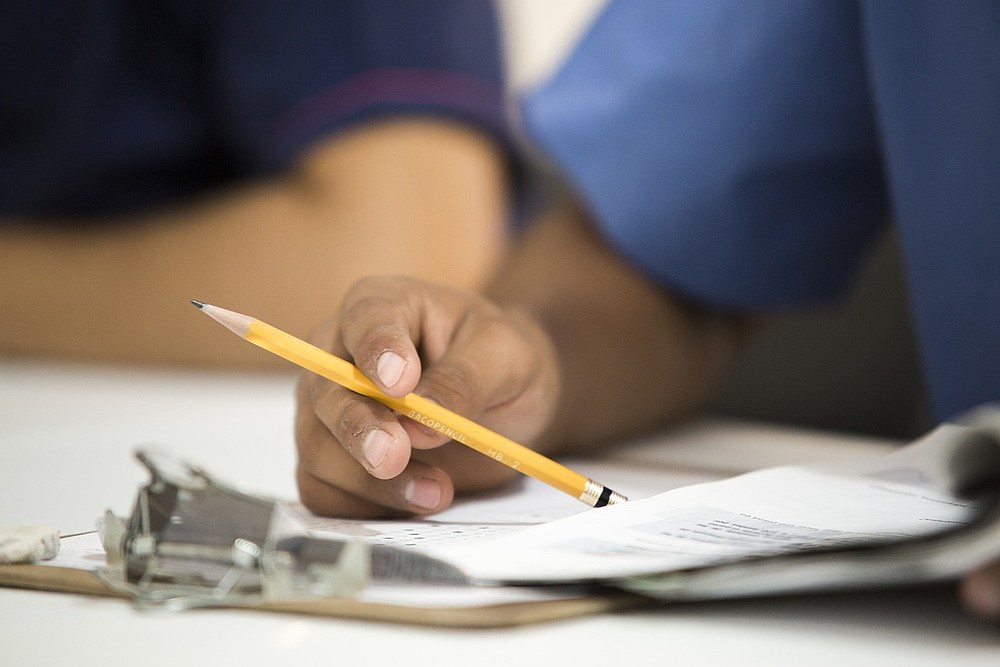 Stift in Hand